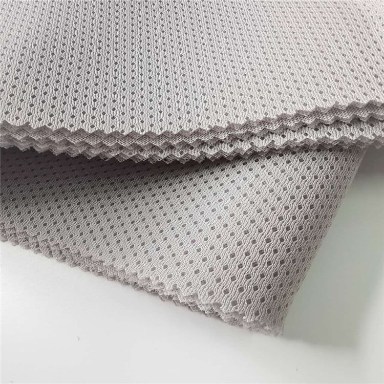 3D spacer fabric cross-section showing triple-layer structure